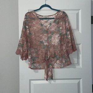 Full Circle Trends cute lace floral top with a tie front